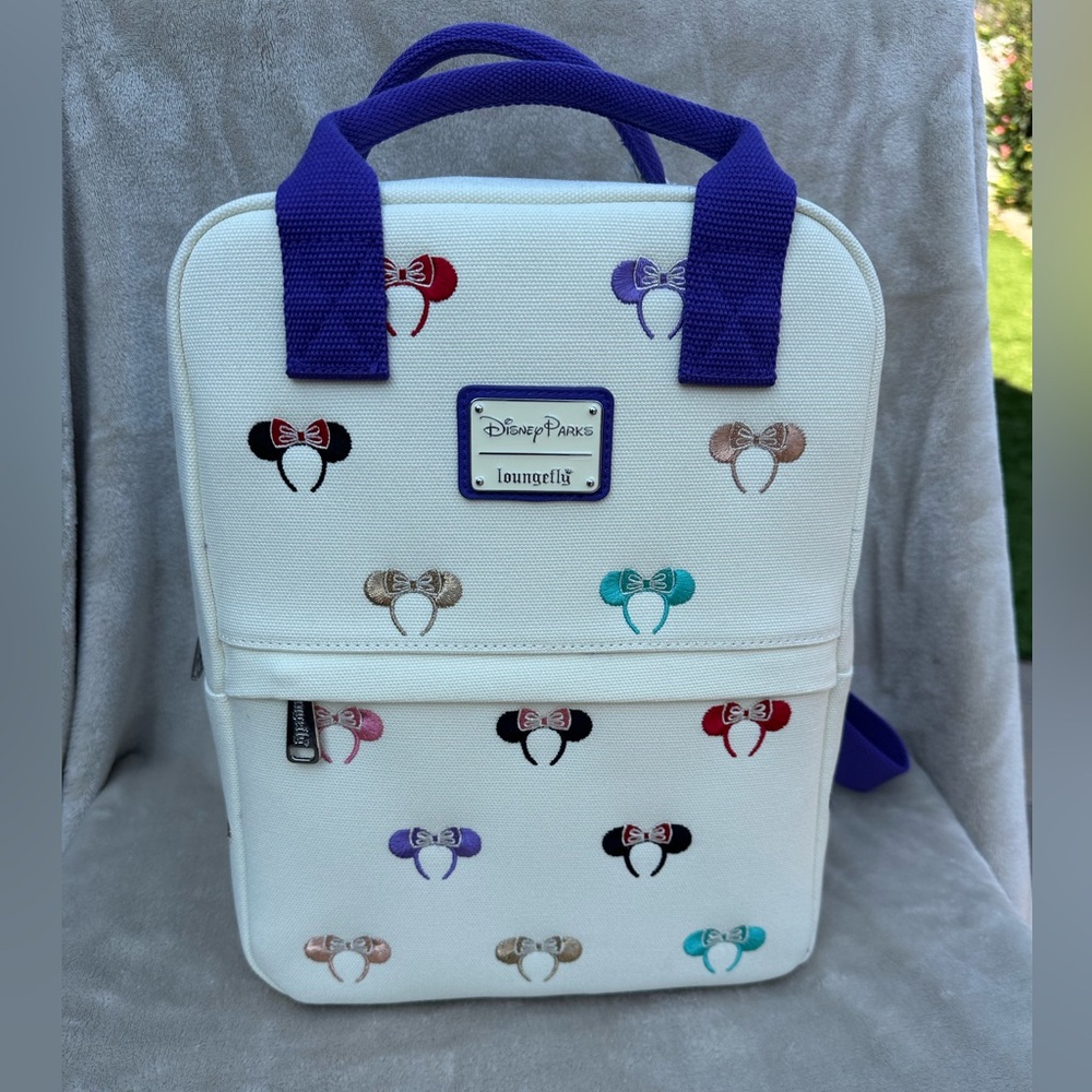 Loungefly Cream and Purple Disney Mini Canvas Backpack